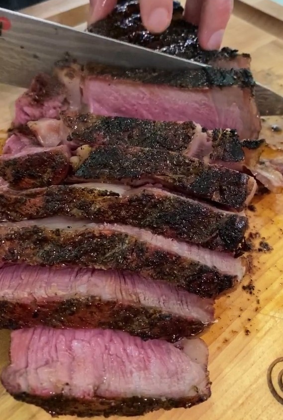 ribeye steak being sliced